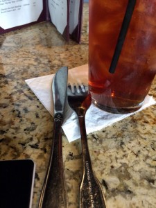 Drink and silverware at restaurant